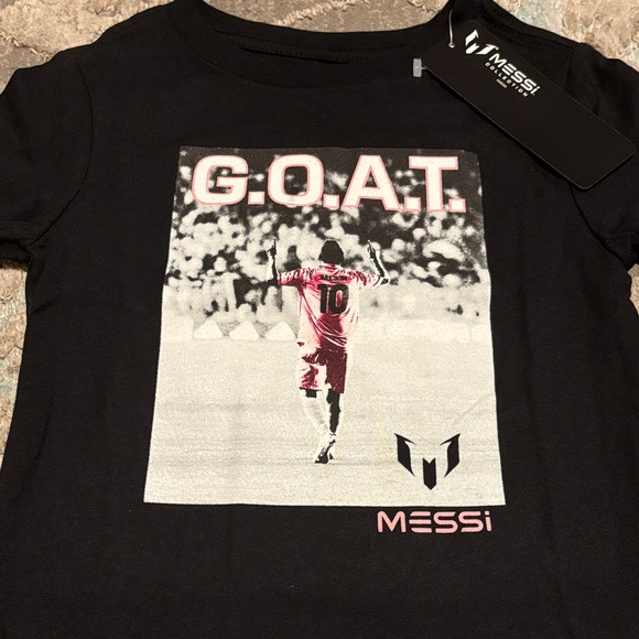 Messi Collection- Black G.O.A.T. Messi T-Shirt with Pink Graphic Highlights - Picture 1 of 2